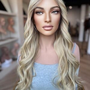 Medium blonde human hair wig by Wigs by Tiffani